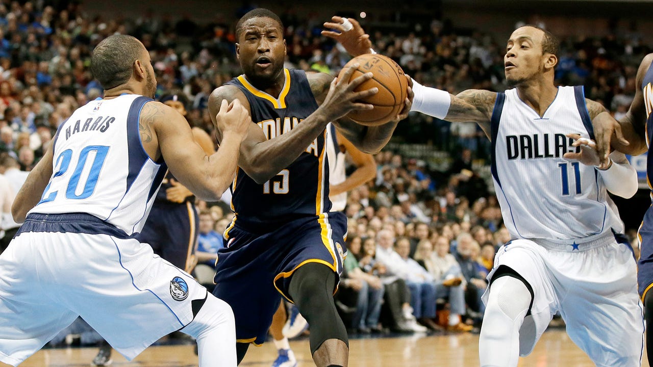 Sloan leads Pacers over Mavericks 111-100